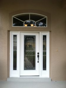 Exterior view of a Lakeland FL home showcasing stunning new windows with front entry door